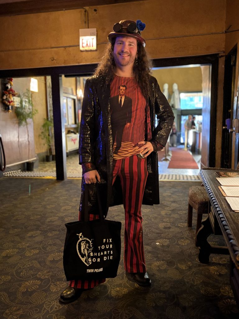 Dante Charlton sporting a Red Room themed outfit