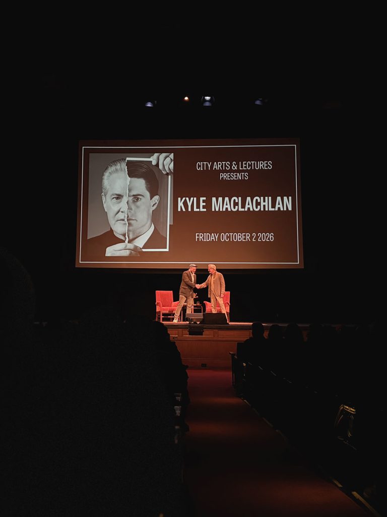 Kyle MacLachlan and Jesse shake hands on Stage