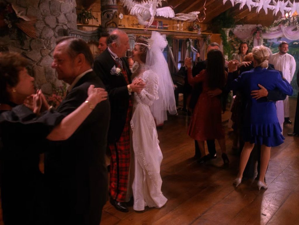 Lana and Dougie dancing on the dance floor with other couples