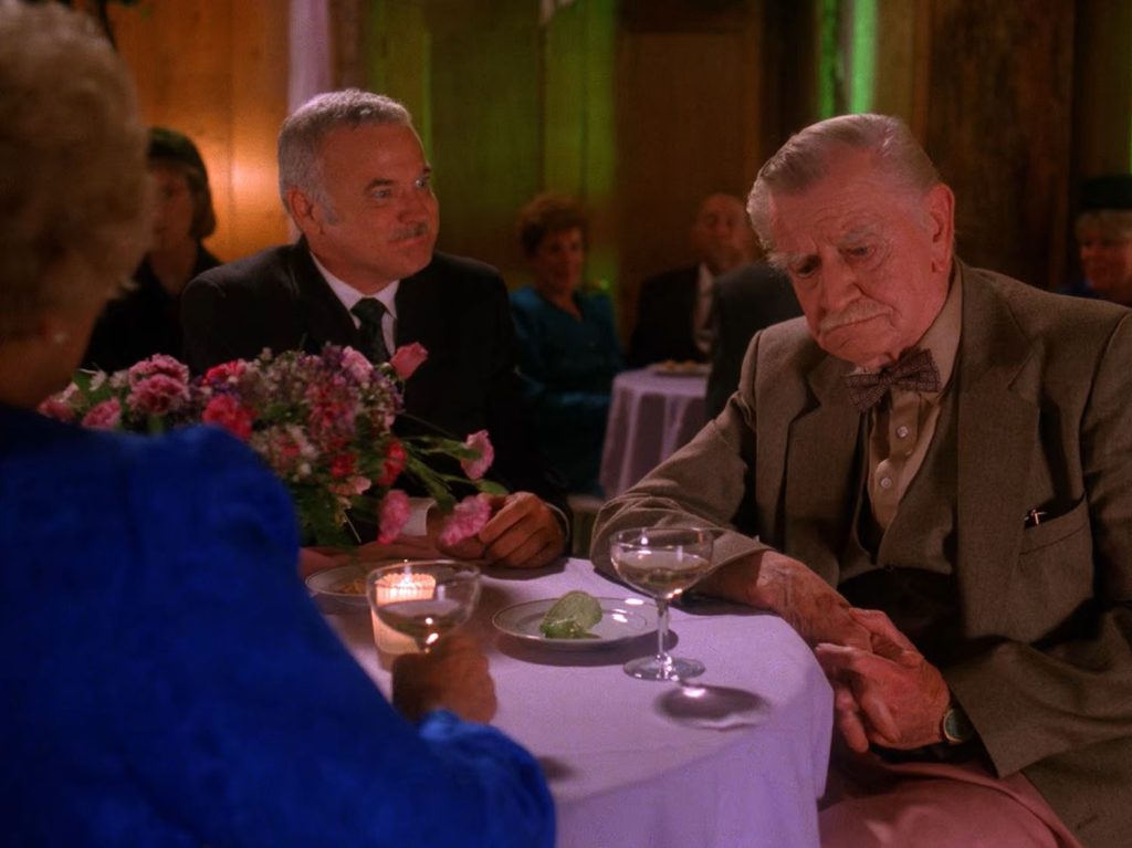 Mayor Milford and Pete Martell at a table
