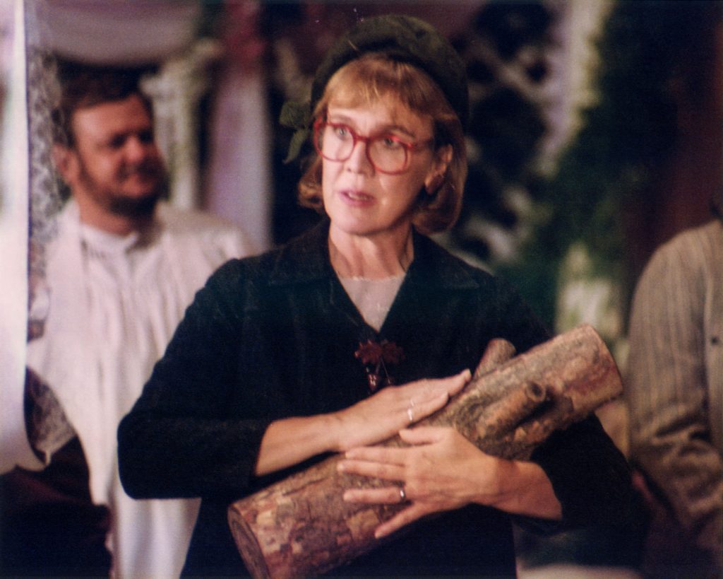 Log Lady holding the log