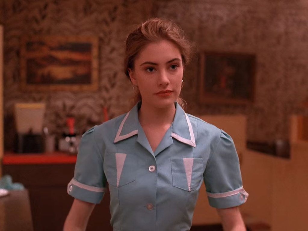Shelly Johnson standing in the Double R Diner