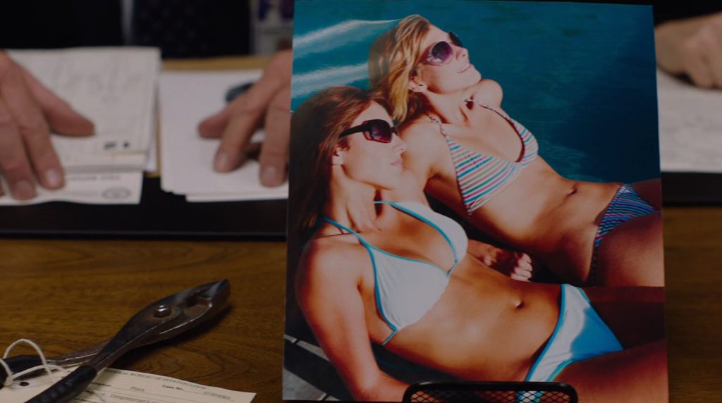 Photo of two women in swimsuits