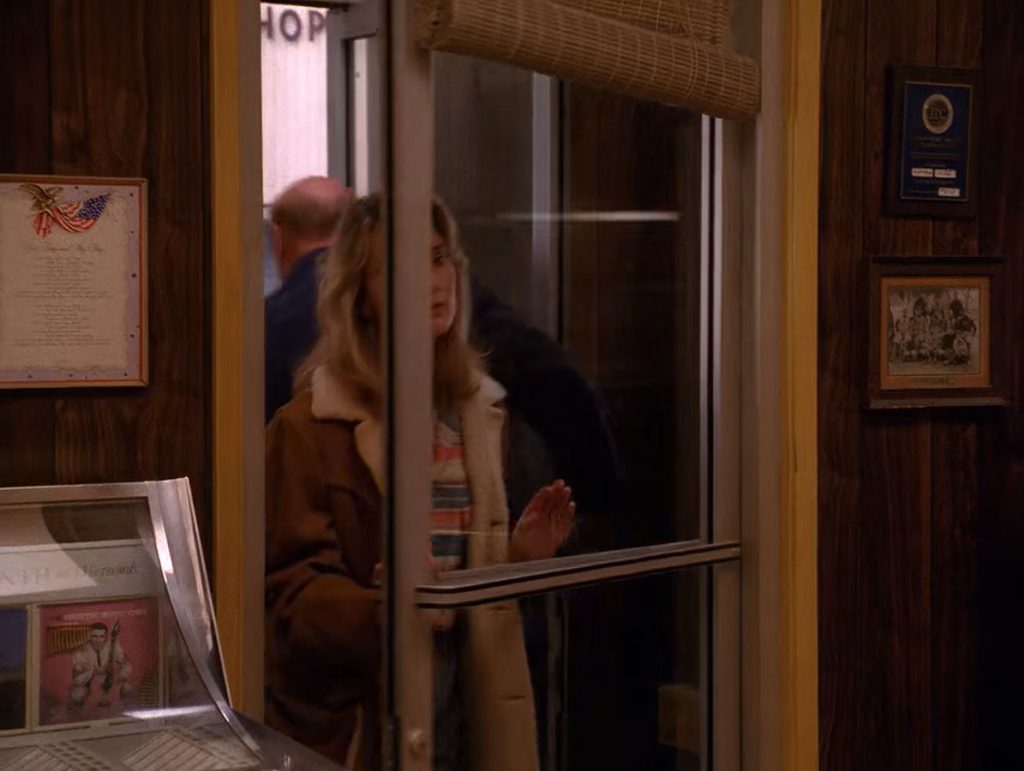 Major Briggs leaving and Norma Jennings enters