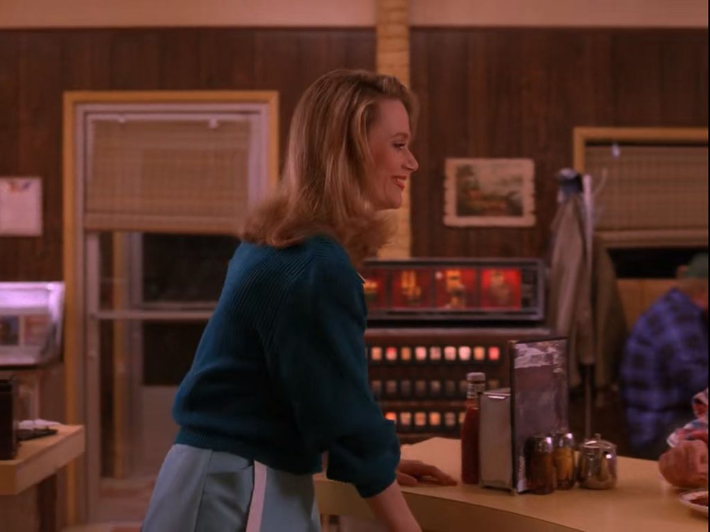 Norma Jennings behind the counter
