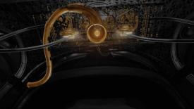 Golden machine hanging from the ceiling with a golden orb floating up
