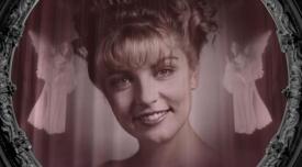Image of Laura Palmer on red curtains