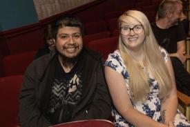 Two people in a theatre