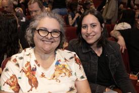 Two people in a theatre