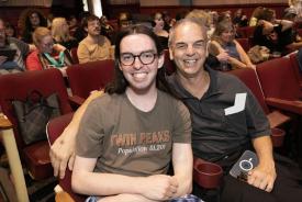 Two people in a theatre