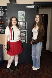 Two people in a theatre