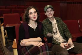 Two people in a theatre