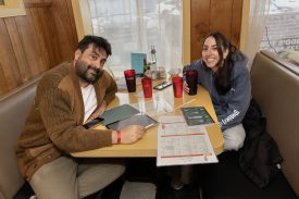 Attendees at Twede's Cafe for Wisteria Lodge show