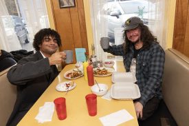 Attendees at Twede's Cafe for Wisteria Lodge show