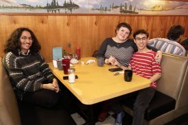 Attendees at Twede's Cafe for Wisteria Lodge show
