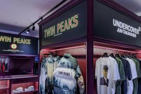Merchandise display of Wonderful and Strange Twin Peaks items inside Undercover store