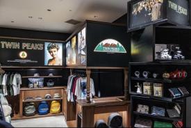 Merchandise display of Wonderful and Strange Twin Peaks items inside Undercover store
